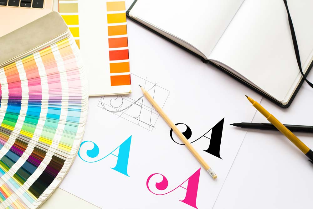graphic-design-logo-composition-with-tools-color-schemes